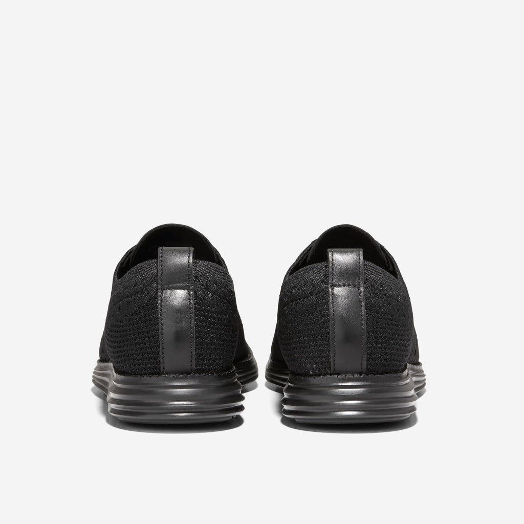 Cole Haan Grand Knit Wingtip II Oxford in black, pair angle