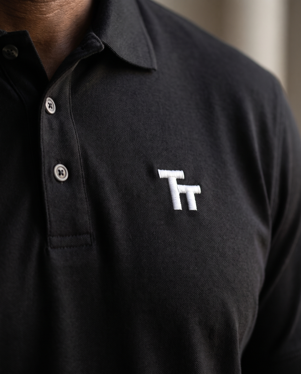 The Standup Polo by TechThreads, embroidery close-up