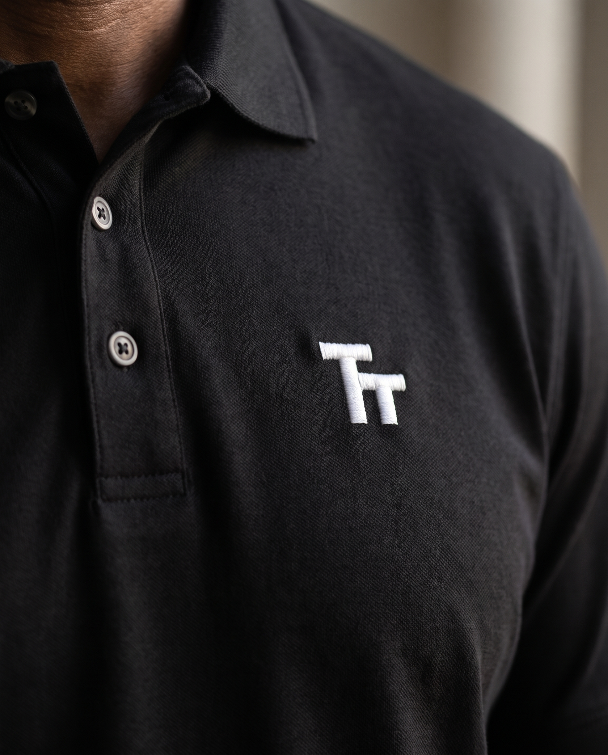 The Standup Polo by TechThreads, embroidery close-up