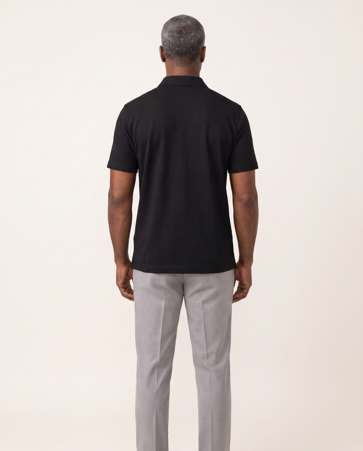The Spark Polo by TechThreads, back on model