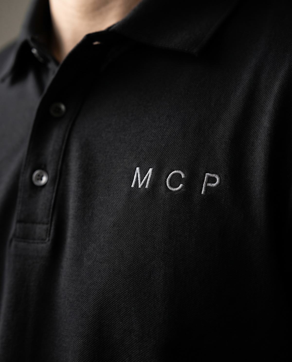 The MCP Polo by TechThreads, embroidery close-up